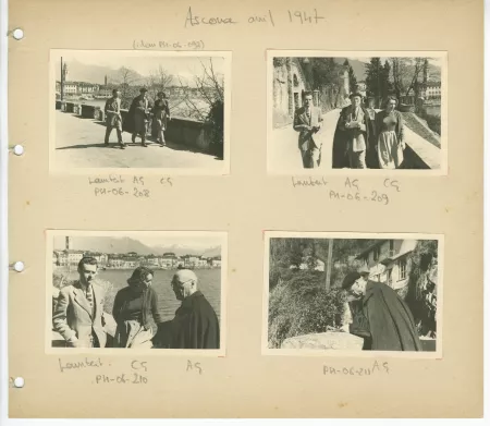 photographie d’André Gide, avec lunettes et béret, Jean Lambert et Catherine Gide, marchant sur la promenade du bord du lac, avril 1947