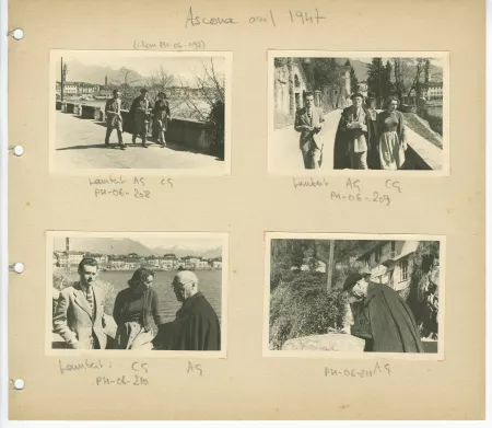 photographie d’André Gide, avec lunettes et béret, Jean Lambert et Catherine Gide, marchant sur la promenade du bord du lac, avril 1947